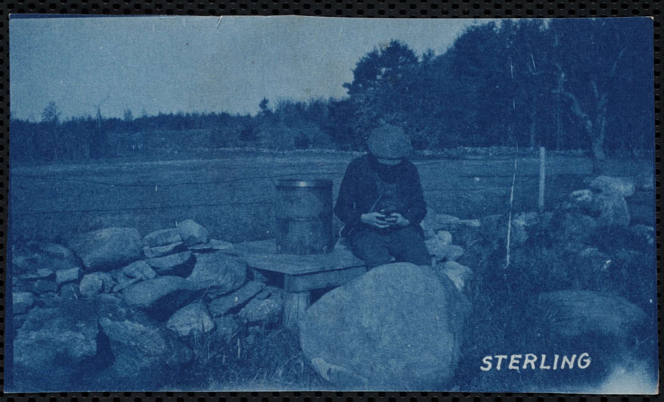 Wachusett Department, person sitting on platform along stone wall with barrel (head is down), Sterling, Mass., ca. 1905-1919