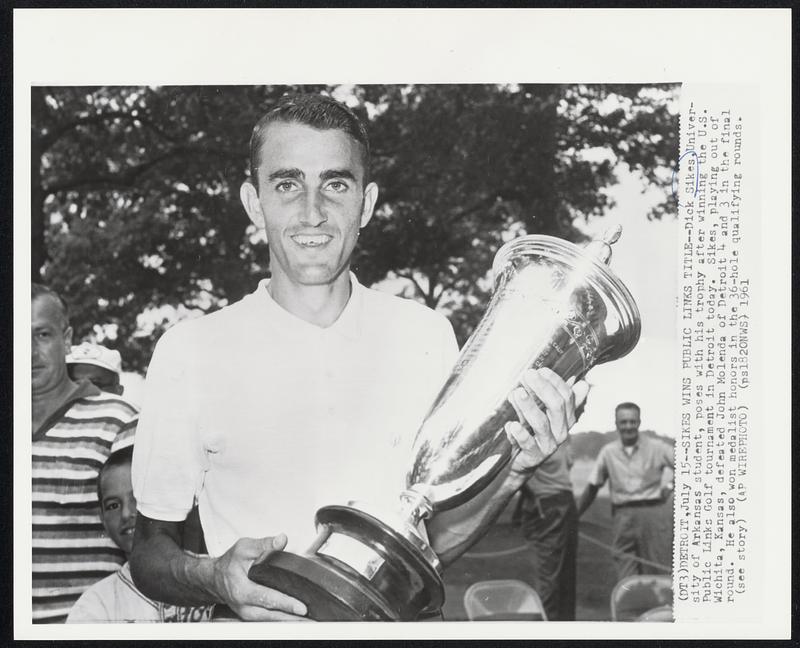 Sikes Wins Public Links Title--Dick Sikes, University of Arkansas student, poses with his trophy after winning the U.S. Public Links Golf tournament in Detroit today. Sikes, playing out of Wichita, Kansas, defeated John Molenda of Detroit 4 and 3 in the final round. He also won medalist honors in the 36-hole qualifying rounds.