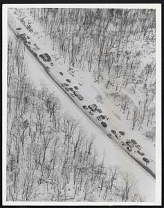 Storm Halts Morning Traffic - At top of photo police car is pulled across Rte. 128 as road block until ploughing crews open up the rest of the busy route yesterday morning.