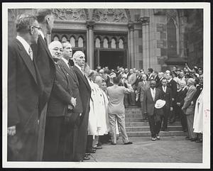 After Cathedral Service – Ex-president Truman (third from left) waits for body of Maurice J. Tobin to be borne from church. On Truman’s right is Gov. Herter. Next to Truman (on his left side) is his secretary, Matthew J. Connolly. Others are William Arthur Reilly, William P. Brennan, Henry M. Leen, Sheriff Howard A. Fitzpatrick and Joseph A. DeMambro.