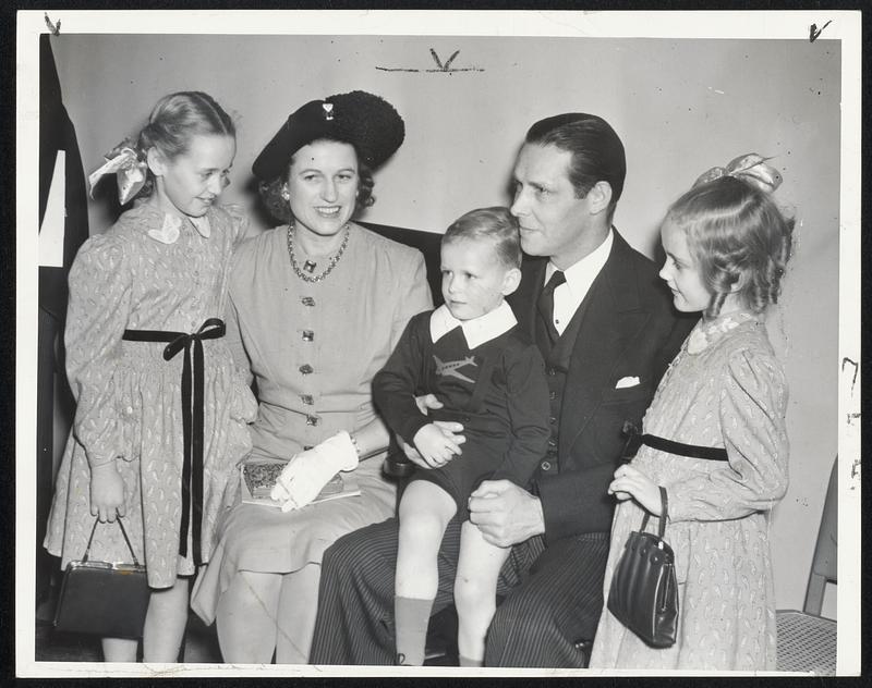 Five Tobins at the Inaugural. Tobin and his family at today's ceremonies in Symphony Hall. Left to right: Mrs. Tobin, Maurice J. Tobin, Jr., the Mayor and Carol Tobin.