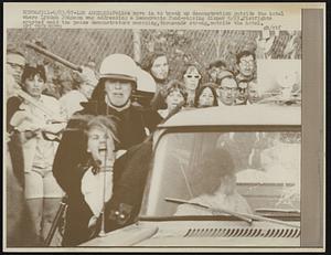 Police move in to break up demonstration outside the hotel where Lyndon Johnson was addressing a Democratic fund-raising dinner 6/23. Fistfights erupted amid the peace demonstrators marching, thousands strong, outside the hotel.