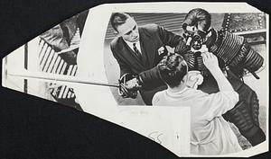 Sword-Scarred Faces are common among German students again. Above, a collegian is treated after losing a duel. He's wearing eye and throat guards.