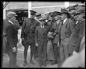 An unidentified group of people, some in military uniform