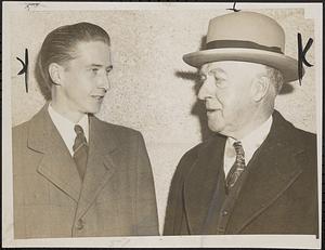 Howard W. Eldredge talking with his attorney, Henry A. Ellis