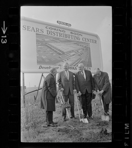 Ground breaking - Sears Roebuck President Crowdus Baker turns first shovel of earth at site of his firm's huge new distribution center just off the Southeast Expressway