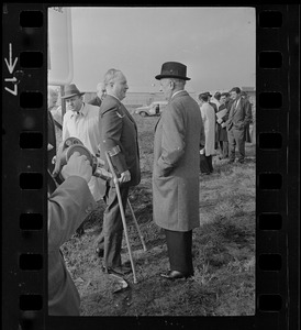 Mayor Collins speaking with an unidentified man, most likely Harold G. Kern, publisher of the Record American-Sunday Advertiser, at the groundbreaking ceremony for the new Sears Distributing Center
