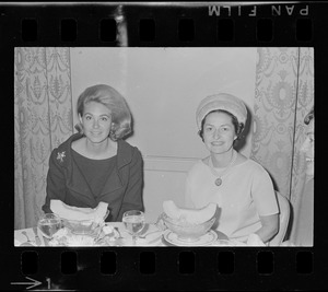 Joan Kennedy left, and Lady Bird Johnson, right, most likely at a luncheon for Democratic women at the Ritz Carlton