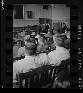 Judge Adlow presiding over a session in Boston Municipal Courtroom where new police officers are observing