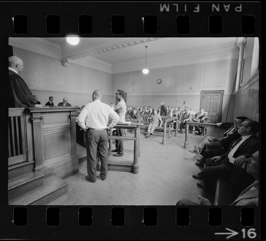 Judge Adlow presiding over a session in Boston Municipal Courtroom where new police officers are observing