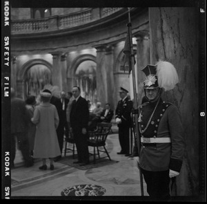 National Lancer standing by an arched entrance to the Hall of Flags during James M. Curley's wake