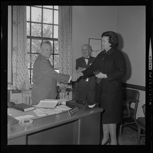 Louise Day Hicks shakes hands with John P. Holland, Dorchester Court Clerk