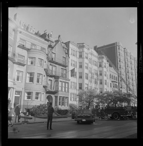 Firetrucks and ladders in front of 528 Beacon Street