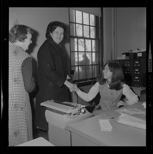 Louise Day Hicks shakes hands with employees of the Dorchester Court