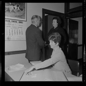 Louise Day Hicks shakes hands with employees of the Dorchester Court