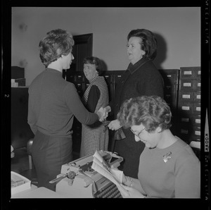 Louise Day Hicks shakes hands with employees of the Dorchester Court