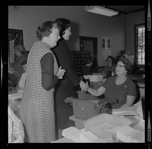 Louise Day Hicks shakes hands with employees of the Dorchester Court