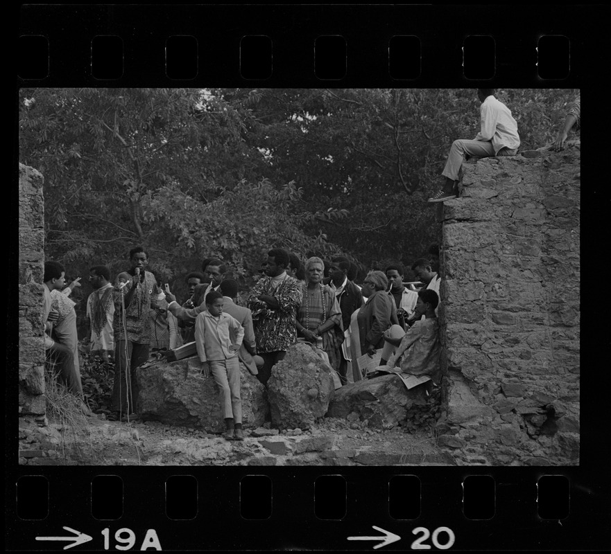 View of speakers, most likely Black community leaders or activists, during Black student rally in Franklin Park
