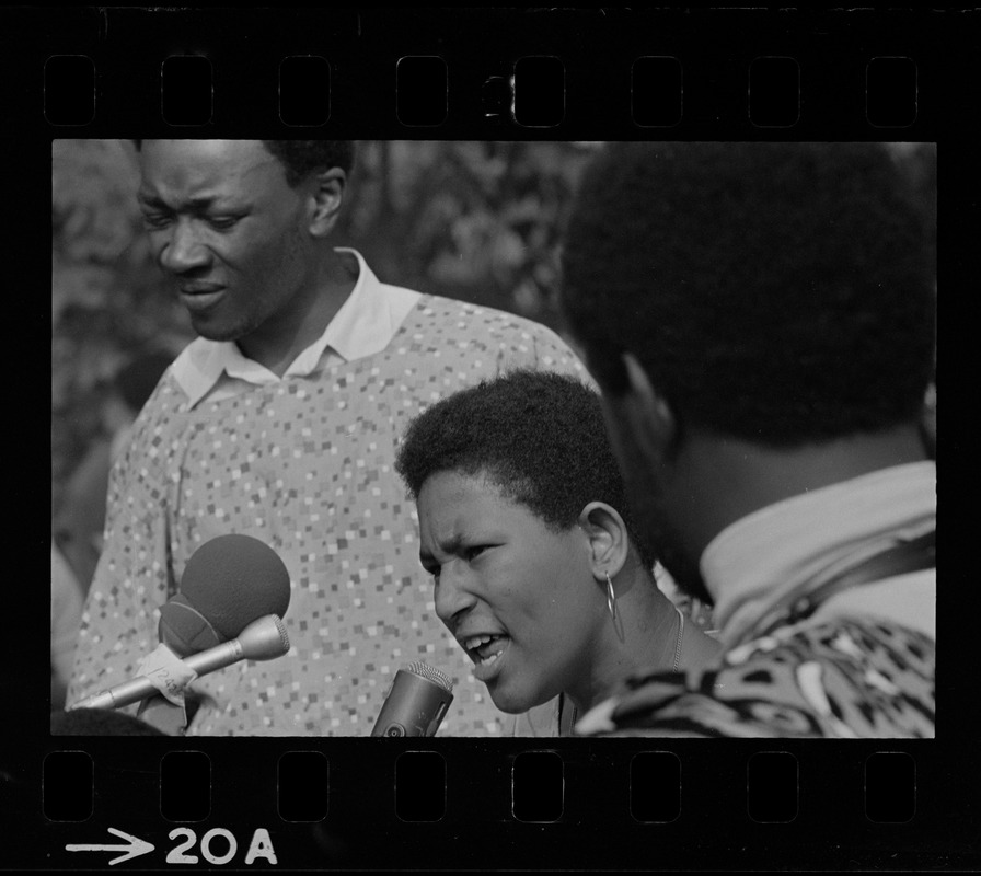Unidentified woman, most likely a Black community leader or activist, addressing the crowd during Black student rally in Franklin Park