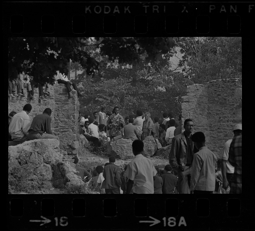 View of speakers, most likely Black community leaders or activists, at Black student rally in Franklin Park