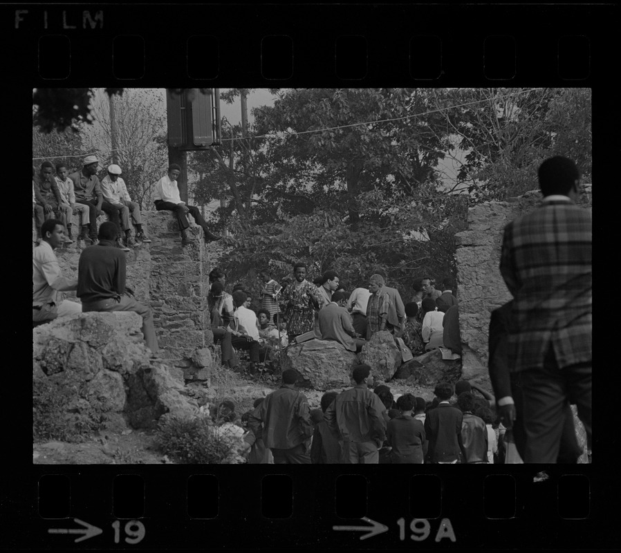 View of speakers, most likely Black community leaders or activists, at Black student rally in Franklin Park