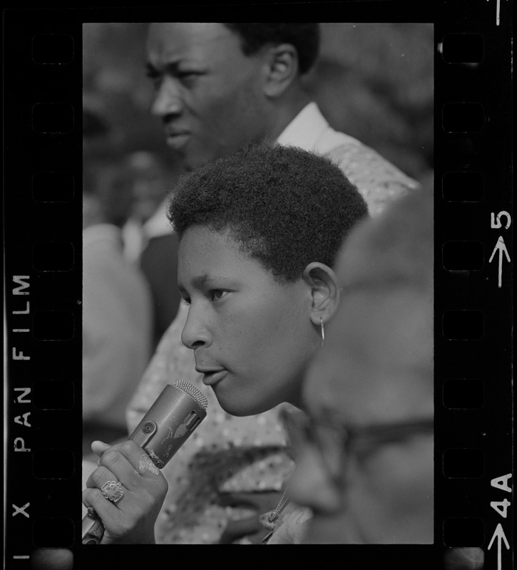 Unidentified woman, most likely a Black community leader or activist, speaking during Black student rally in Franklin Park
