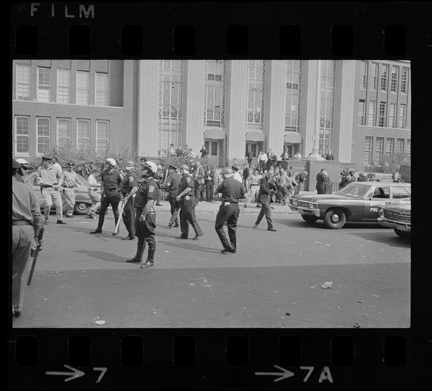 Police in front of Jeremiah E. Burke High School in Dorchester during student demonstrations