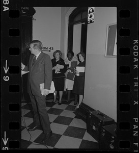 Partial view of newsman interviewing Mayor White outside City Council library after an all-day closed-door session with Mothers for Adequate Welfare