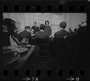 Louise Day Hicks speaking to a group of men at a restaurant, most likely campaigning for mayor or city council