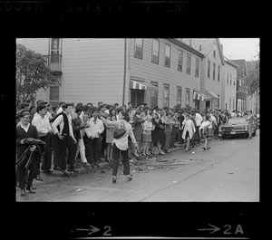 Crowd of students across the street from East Boston High School during time of student demonstrations