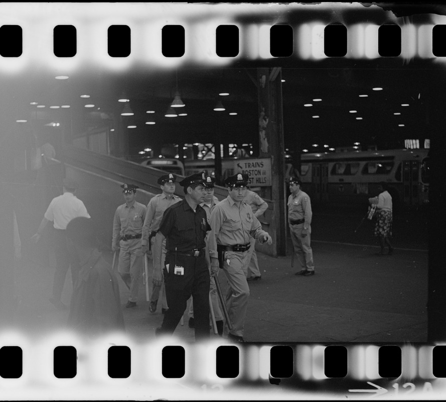 Police officers in the Dudley St. MBTA terminal during time of student demonstrations at nearby high schools