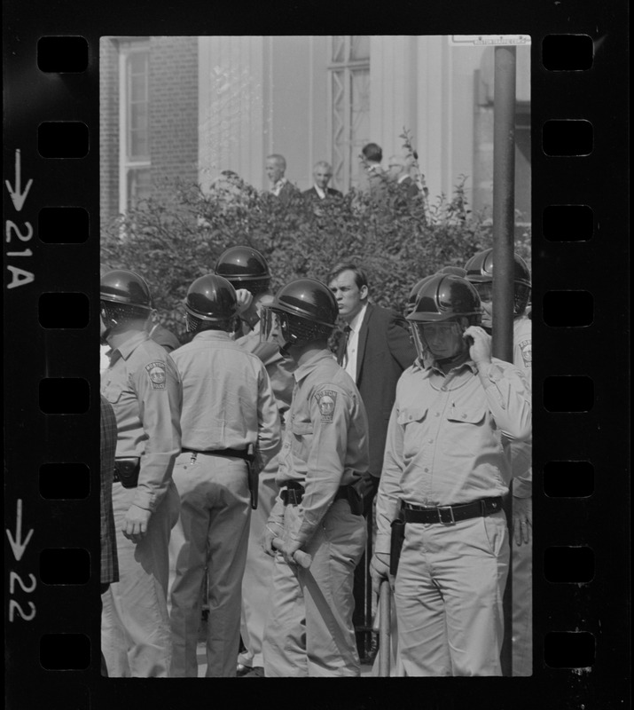 Riot police in front of Jeremiah E. Burke High School after unrest broke out during student demonstrations