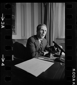 Mayor White seated at his desk during his weekly press conference