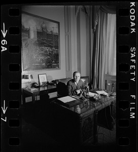 Mayor White seated at his desk during his weekly press conference