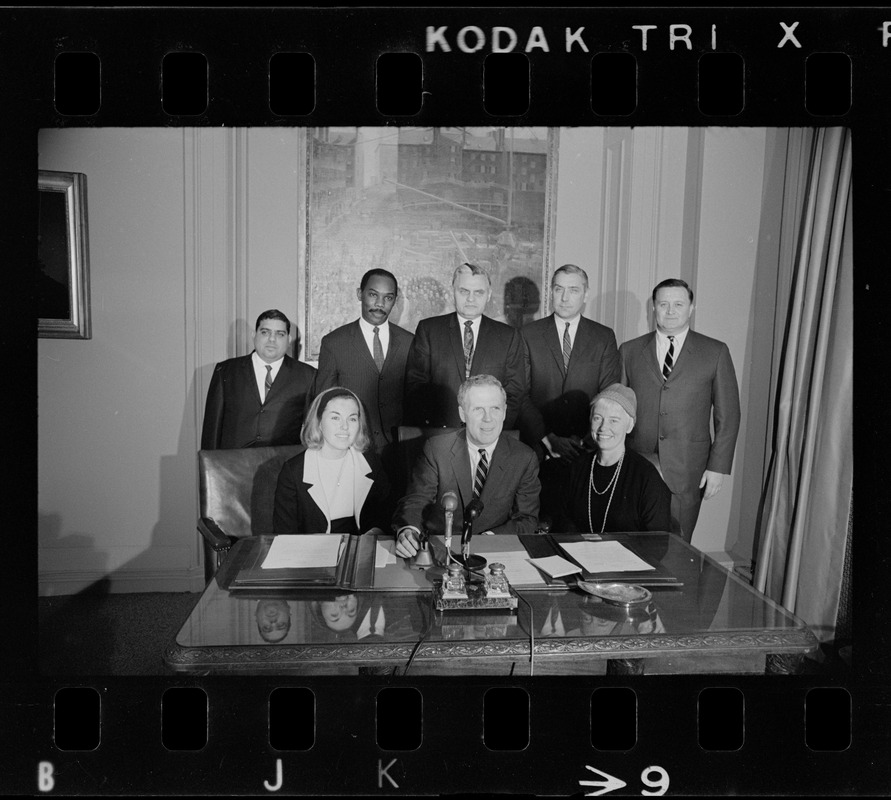 Mayor White and his appointees in his office - seated, Joanne Prevost, Mayor White and Mrs. Barbara Cameron; standing, Ivan Gonzalez, Irving Hemenway, Francis Gens, Daniel Finn and John Mulhern