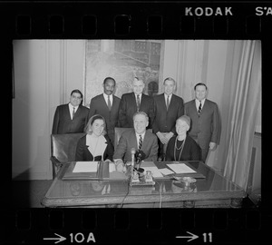 Mayor White and his appointees in his office - seated, Joanne Prevost, Mayor White and Mrs. Barbara Cameron; standing, Ivan Gonzalez, Irving Hemenway, Francis Gens, Daniel Finn and John Mulhern