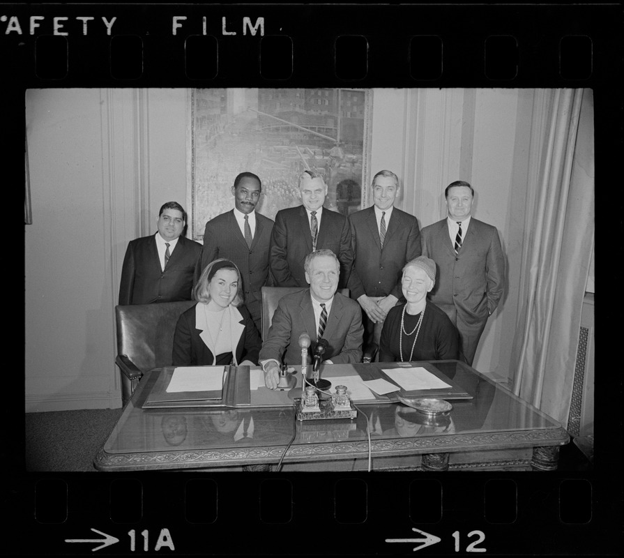 Mayor White and his appointees in his office - seated, Joanne Prevost, Mayor White and Mrs. Barbara Cameron; standing, Ivan Gonzalez, Irving Hemenway, Francis Gens, Daniel Finn and John Mulhern