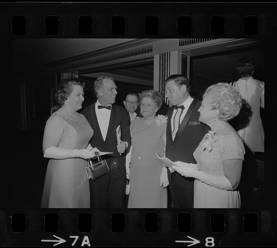 Mayor White, second from left, with a group of unidentified men and women at formal event
