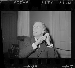 Boston young mayor Kevin White taking a call from his office in City Hall