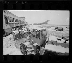 Clearing snow after blizzard at local Airport, East Boston