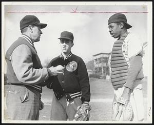 Coach Dick Gibson, Dan Sansom, pitcher. Jim Taylor, catch