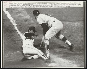 Giants-Braves-San Francisco: San Francisco Giants outfielder Frank Johnson is tagged out at home plate by Atlanta Braves catcher Bob Tillman in the 6th inning on a peg from shortstop Clete Boyer. Jim Ray Hart had hit to Boyer.