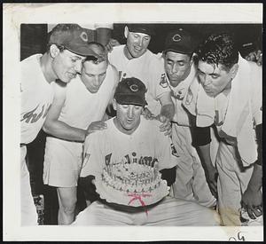 Happy Birthday for Al Lopez whose Cleveland Indians took over first place by beating the Senators last night, 5-3, to lead the League by one game. Helping to win the game and assisting their 43-year-old boss to blow out the candles are, left to right, home-run hitters Bob Avila, Al Rosen, Dale Mitchell, Harry Simpson, and 17-game wining pitcher1 Mike Garcia.