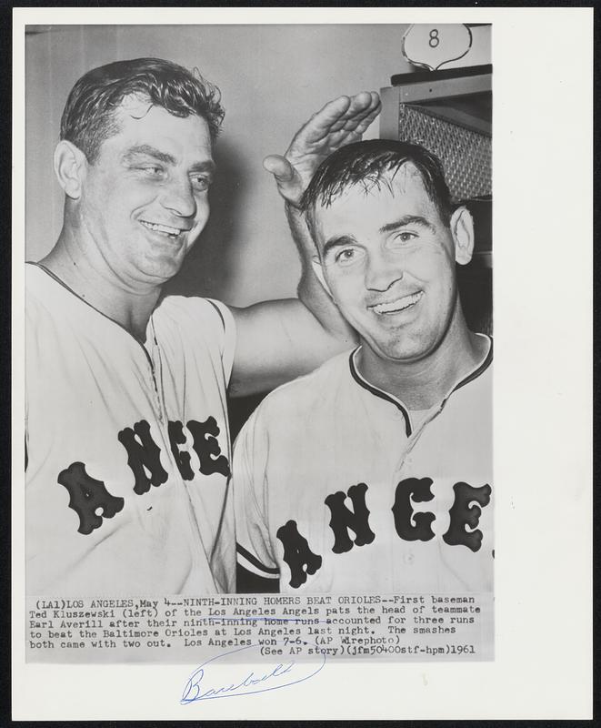 Ninth-Inning Homers Beat Orioles--First baseman Ted Kluszewski (left) of the Los Angeles Angels pats the head of teammate Earl Averill after their ninth-inning home runs accounted for three runs to beat the Baltimore Orioles at Los Angeles last night. The smashes both came with two out. Los Angeles won 7-6.