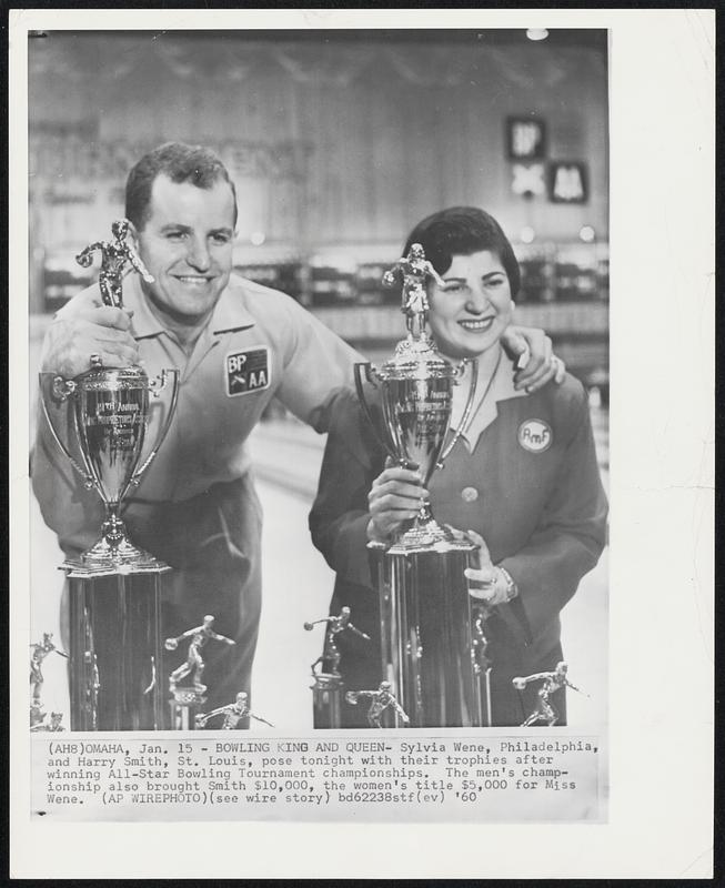 Bowling King and Queen-Sylvia Wene, Philadelphia, and Harry Smith, St. Louis, pose tonight with their trophies after winning All-Star Bowling Tournament championships. The men's championship also brought Smith $10,000, the women's title $5,000 for Miss Wene.