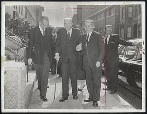 A Gallant Farewell-Former Mayor Frederick W. Mansfield is aided at St. Cecilia's Church, Back Bay, where he went for funeral services for his wife, Helena. The elderly ex-mayor left St. Elizabeth's Hospital where he and Mrs. Mansfield had been in adjoining rooms for some time.