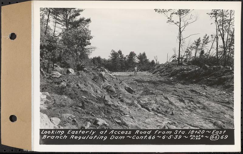 Contract No. 66, Regulating Dams, Middle Branch (New Salem), and East Branch of the Swift River, Hardwick and Petersham (formerly Dana), looking easterly at Access Road from Sta. 18+20, east branch regulating dam, Hardwick, Mass., Jun. 5, 1939