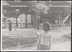 Jeniell standing at a playground