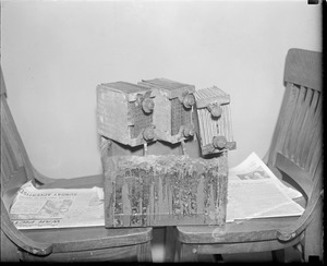 Needham bank murder and robbery showing batteries and number plates that were disposed of by gangsters before auto was set afire