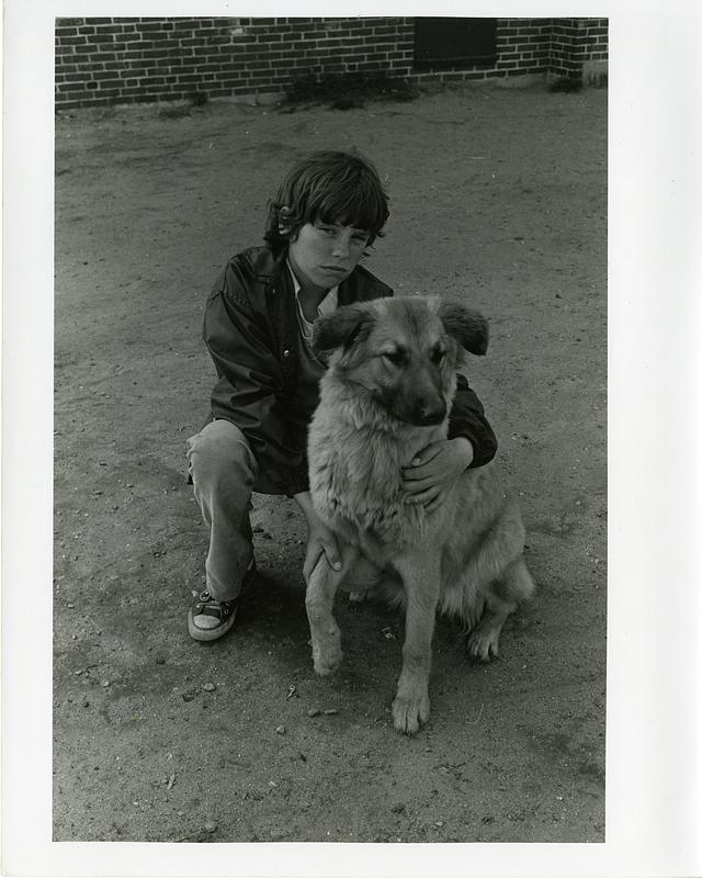 Portrait of a boy and a dog